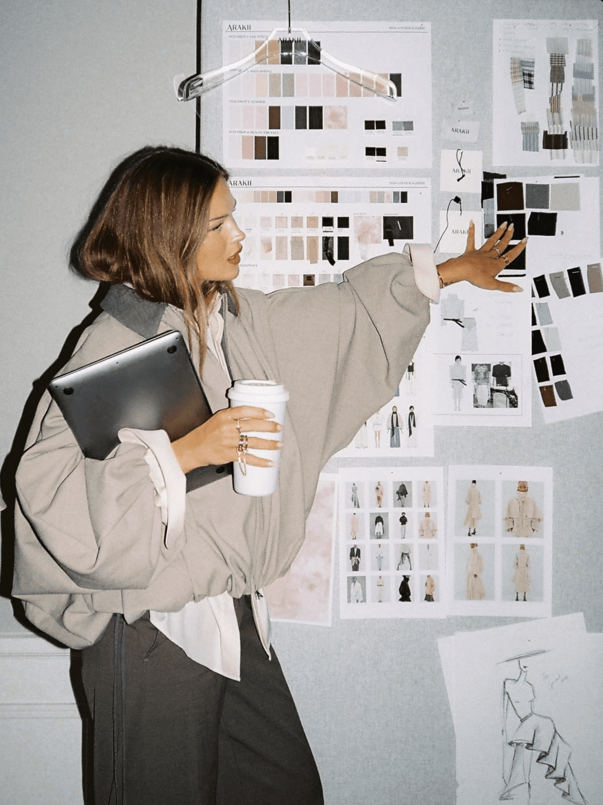 Fashion designer working with portfolio